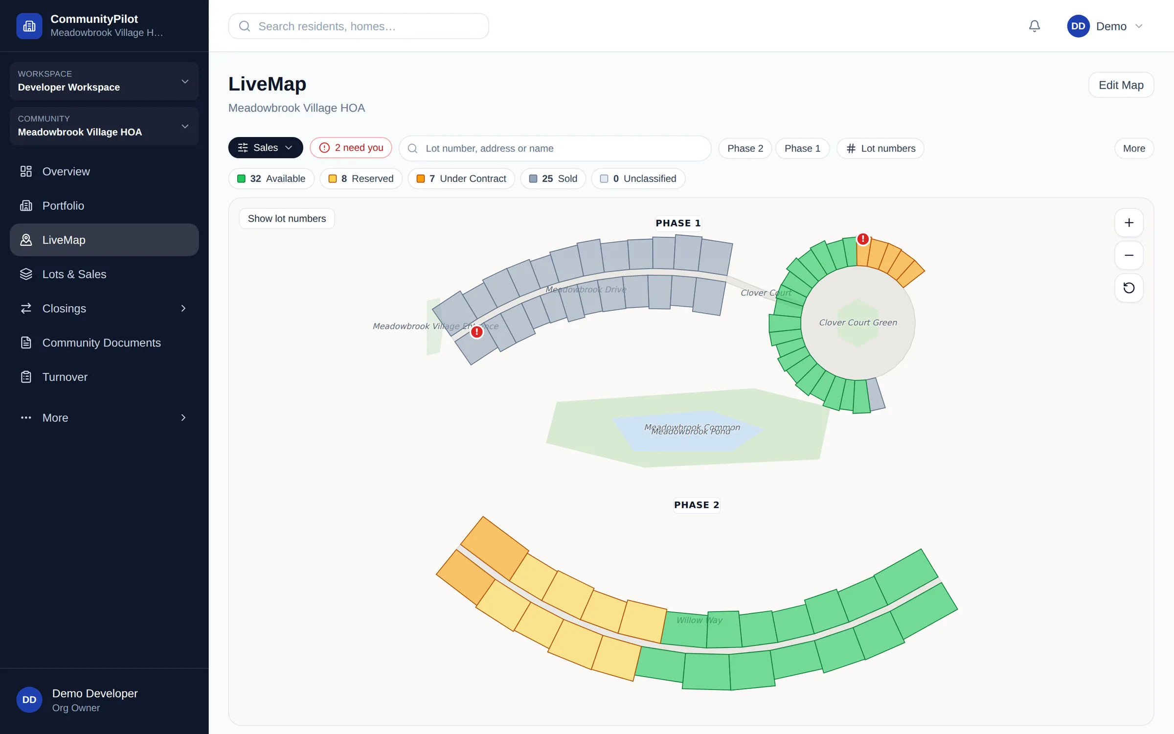 CommunityPilot LiveMap showing a neighborhood plat: each lot is coloured by sales status — 32 available, 8 reserved, 7 under contract, 25 sold — across Phase 1 and Phase 2, with common areas and a pond.